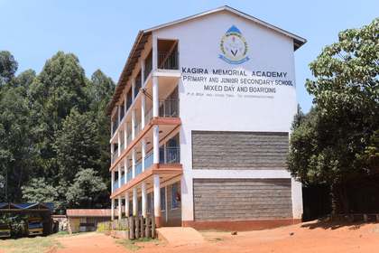 The Kagira Memorial Academy administration block, bearing the school name and crest.