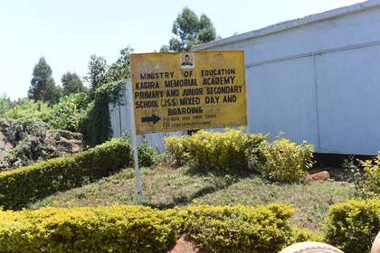 The Ministry of Education signboard at the school entrance.