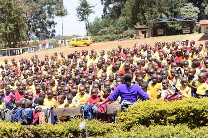 A wide view of learners gathered for assembly.