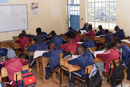 A full classroom of learners during a lesson.